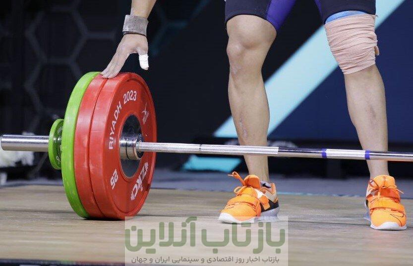 عکس | کوچ قهرمان وزنه‌برداری به بحرین!