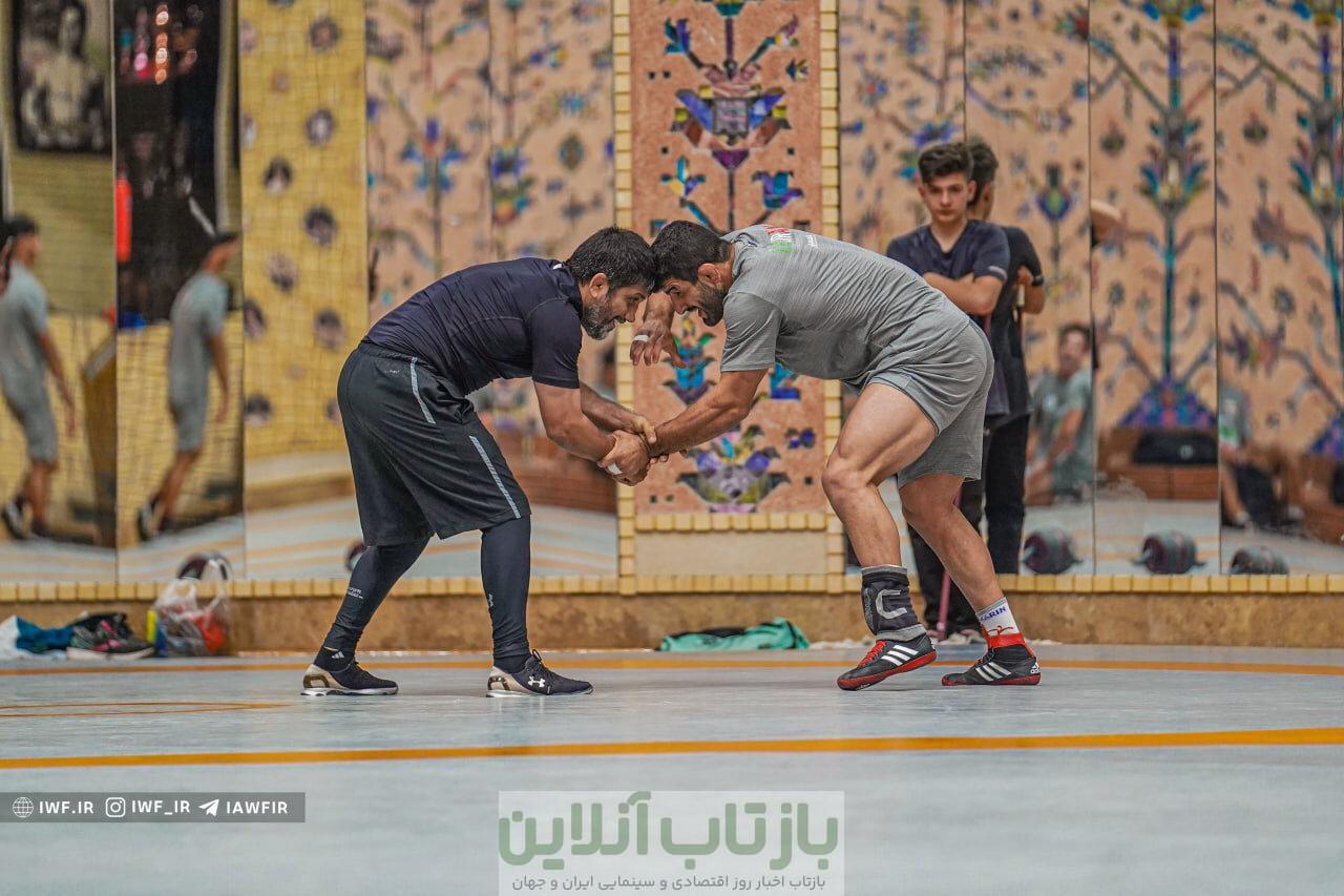 عکس| قهرمان المپیک در جمع قهرمانان دنیا: شما بهترین هستید